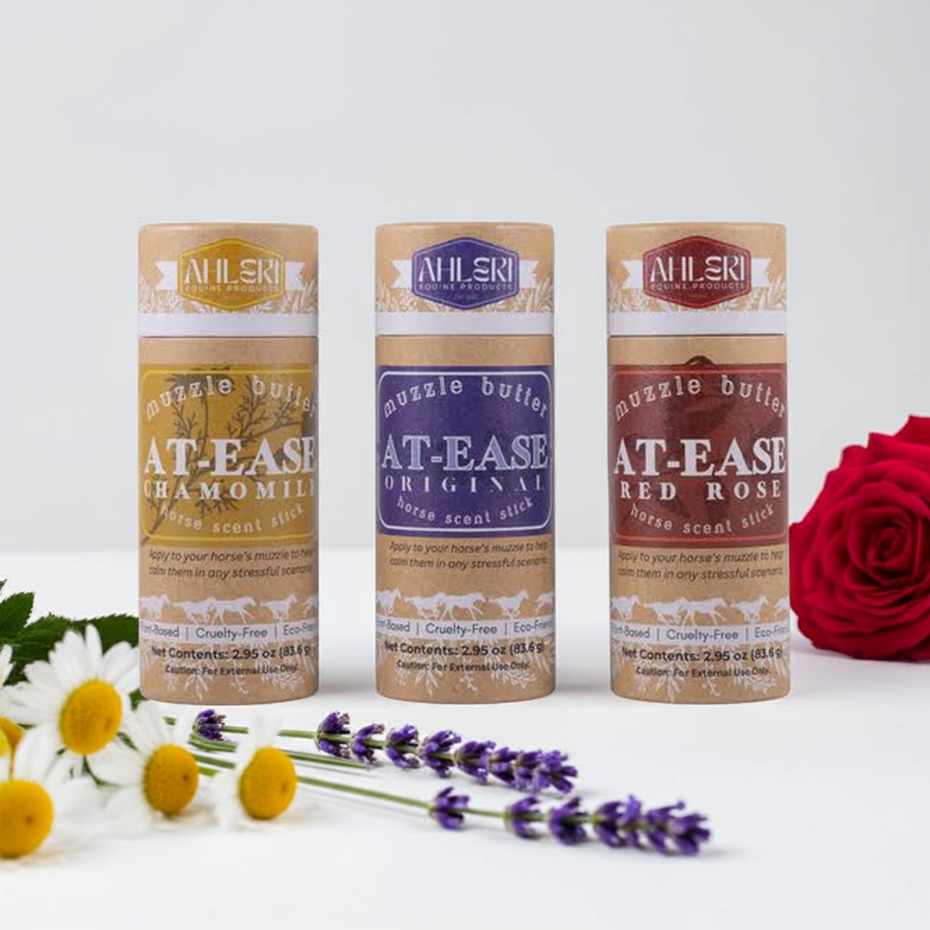 Three Ahleri Muzzle Butter: At-Ease products with flowers on a white background